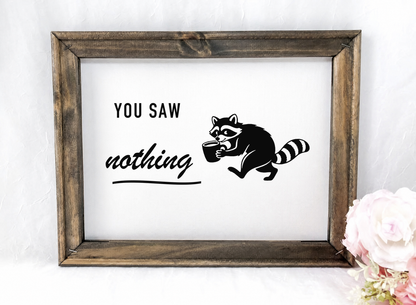 You Saw Nothing raccoon coffee framed canvas sign in a rustic wood frame